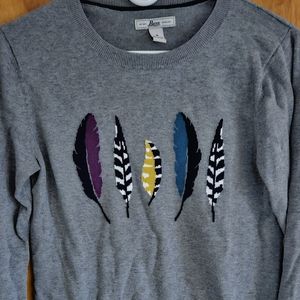 Bass sweater with bird feather design
